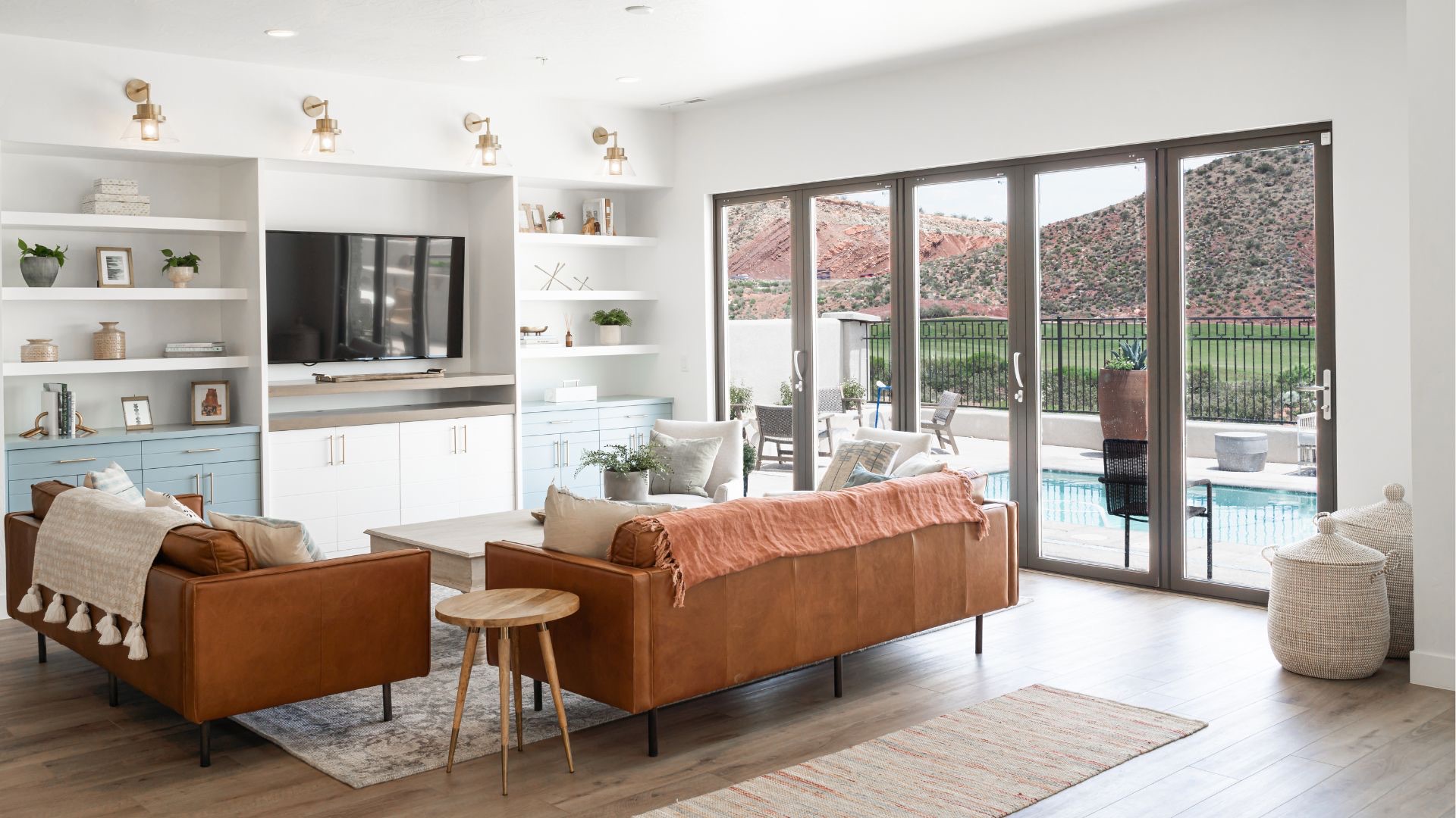 Bright Southern Utah living room with red-rock views through clean, tinted glass